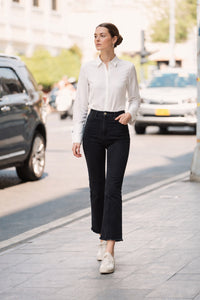 DENIM TROUSERS WITH FRINGED CUFF