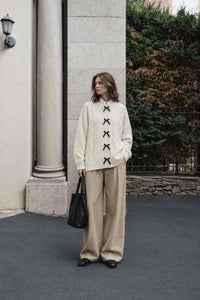 KNITTED CARDIGAN WITH BOW DETAILS