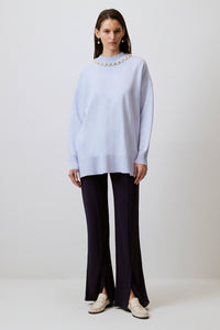 SWEATER WITH A BEADED COLLAR