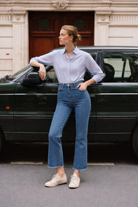 DENIM TROUSERS WITH FRINGED CUFF